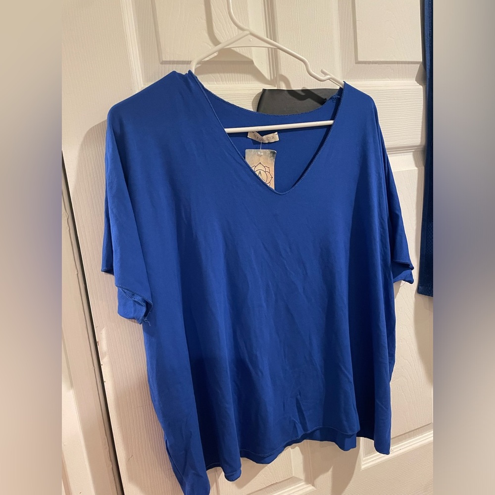 Brand New Beautiful Blue T Shirt XL Bought in Tarifa Spain and never wore it